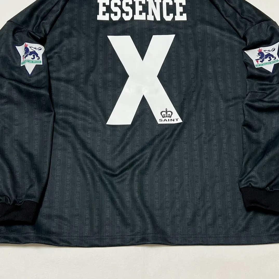 SAINT M×××××× SOCCER SHIRT 'FAITH'/BLK FAITH Football Long Sleeve Black S-XL This design has a lot of craftsmanship Digital fabric printing/front positioning printing laser cutting Offset printing + flocking printing + embossing Imported Behringer machine embroidery Flat machine collar + cuffs Genuine consistent main mark/wash mark/cherub mark
